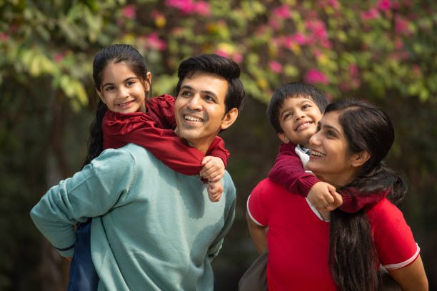 Happy parents with their child at Happy Kids Clinic, Wagholi